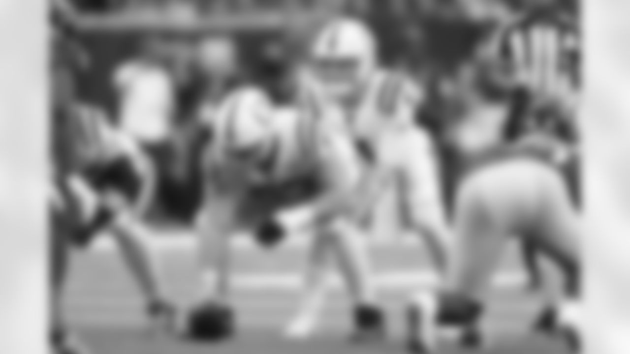 4 QB Sam Ehlinger, #63 G Danny Pinter