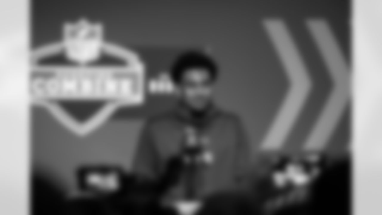 Alabama Quarterback Bryce Young talks with the media at the 2023 NFL Scouting Combine.