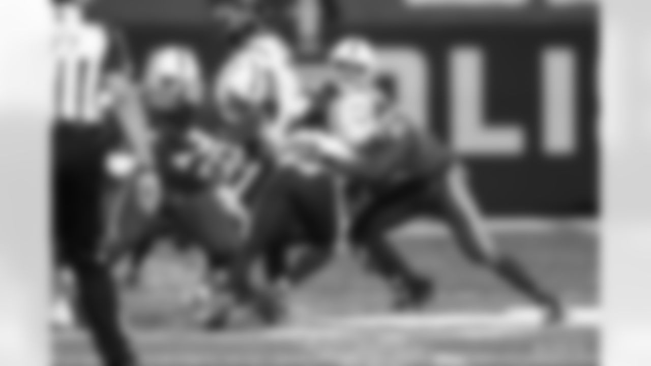 76 DT Taylor Stallworth, #97 DE Al-Quadin Muhammad