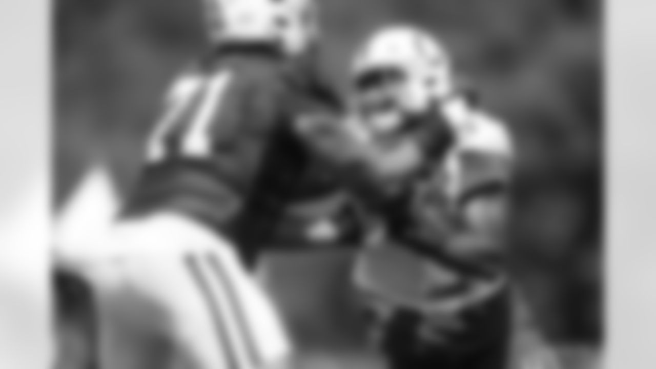 71 T Jordan Murray, #94 DT/DE Tyquan Lewis