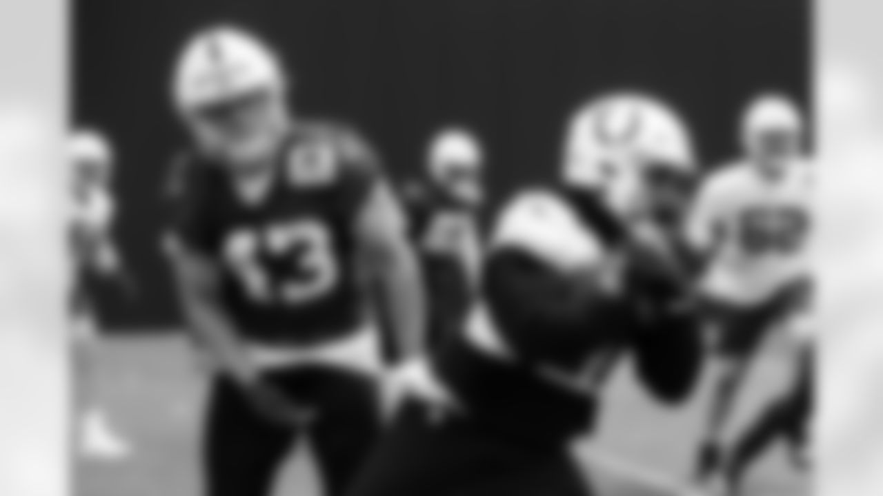 43 S Trevor Denbow, 21 WR Zack Moss,
Players practice during voluntary Veteran Mini Camp offseason workouts.
