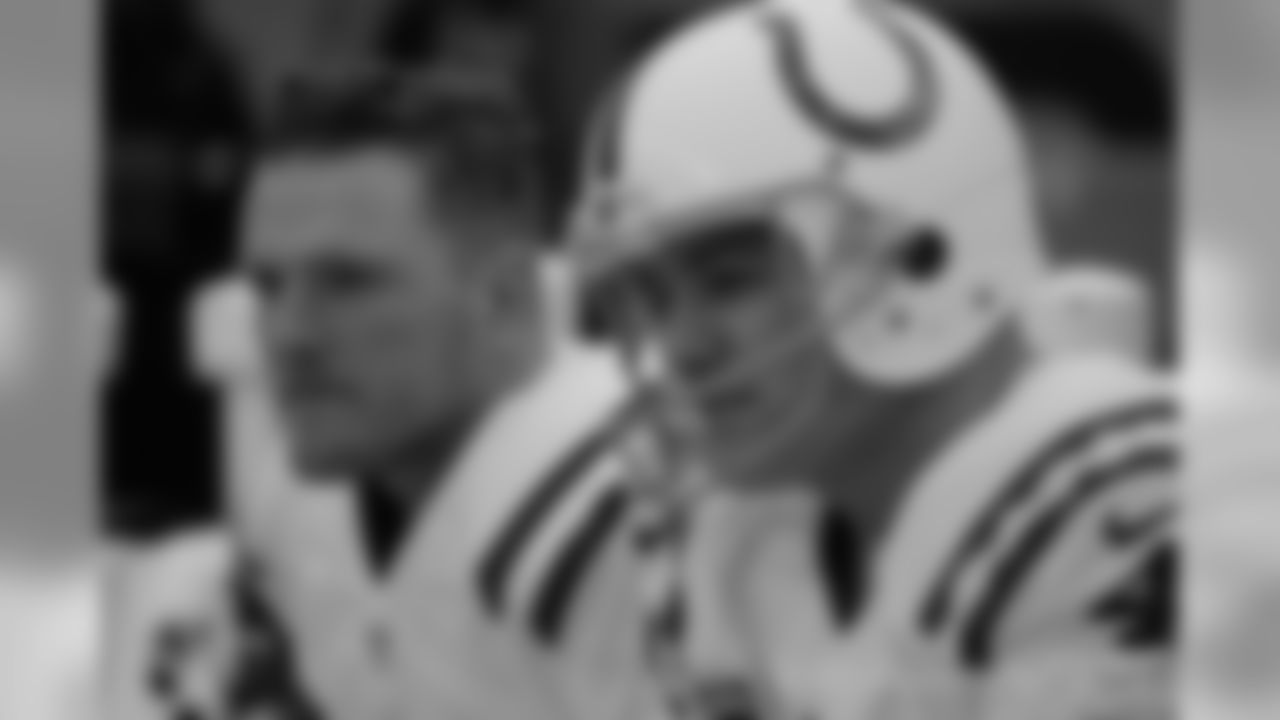 Adam Vinatieri and Pat McAfee pre-game on the Colts bench.