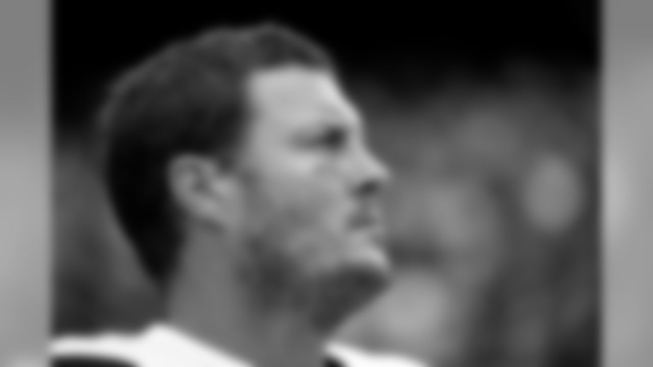 FILE - In this Dec. 29, 2019, file photo Los Angeles Chargers quarterback Philip Rivers stands for the national anthem before an NFL football game against the Kansas City Chiefs in Kansas City, Mo. Rivers' career with the Los Angeles Chargers has come to an end. The franchise announced Monday, Feb. 10, 2020, that Rivers will enter free agency and not return for the upcoming season. (AP Photo/Charlie Riedel, File)