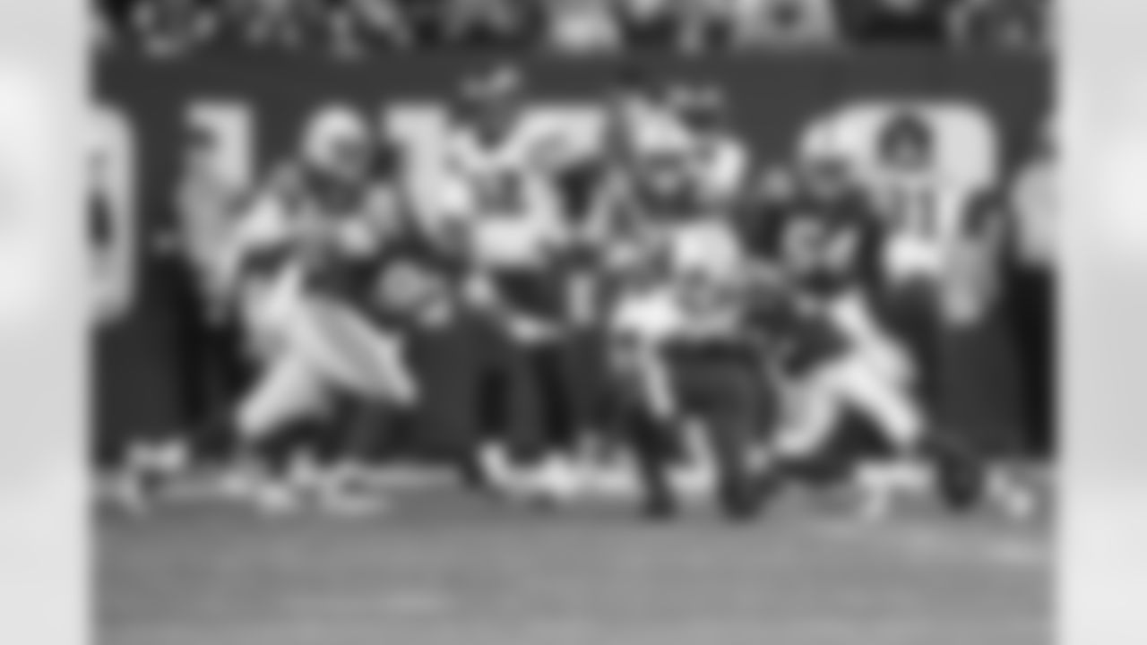54 DE Dayo Odeyingbo, #90 DT Grover Stewart,, #32 S Julian Blackmon