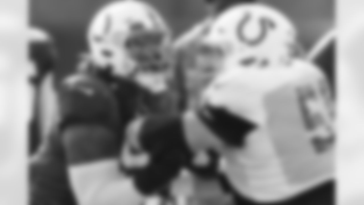 99 DT DeForest Buckner, #56 C/G Quenton Nelson