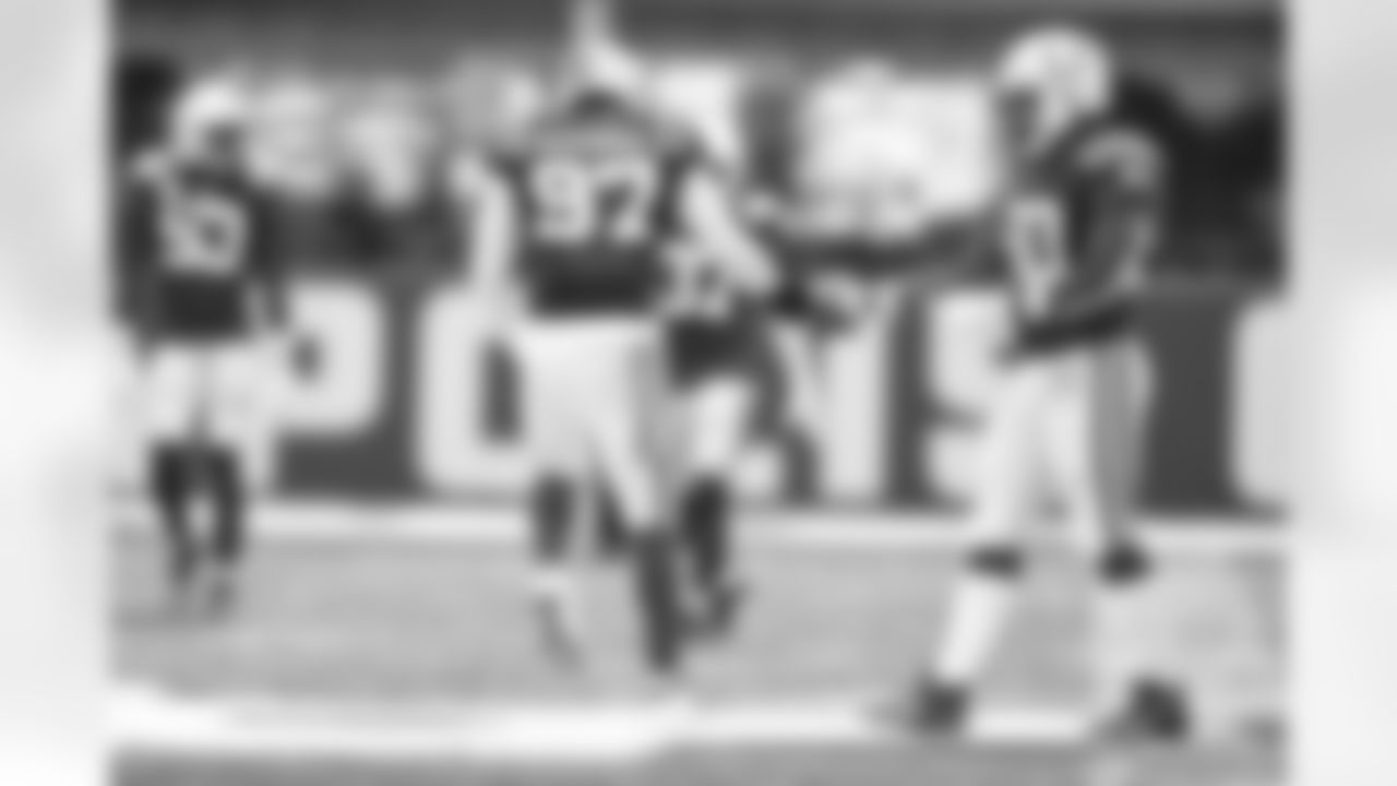 97 DE Al-Quadin Muhammad, #50 DE Justin Houston