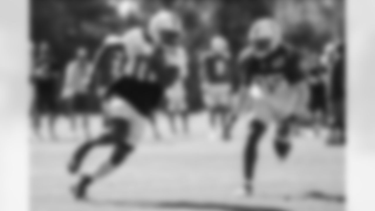 10 WR Daurice Fountain, #35 CB Tremon Smith