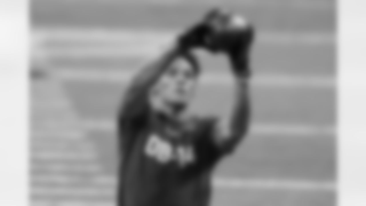 Oregon defensive back Christian Gonzalez runs a drill at the NFL football scouting combine in Indianapolis, Friday, March 3, 2023. (AP Photo/Michael Conroy)