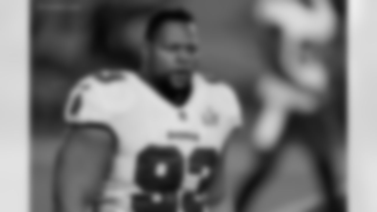 Tampa Bay Buccaneers defensive end Ndamukong Suh (93) walks toward the sideline during the second half of the NFL Super Bowl 55 football game against the Kansas City Chiefs, Sunday, Feb. 7, 2021, in Tampa, Fla. The Tampa Bay Buccaneers defeated the Kansas City Chiefs 31-9. (AP Photo/Steve Luciano)