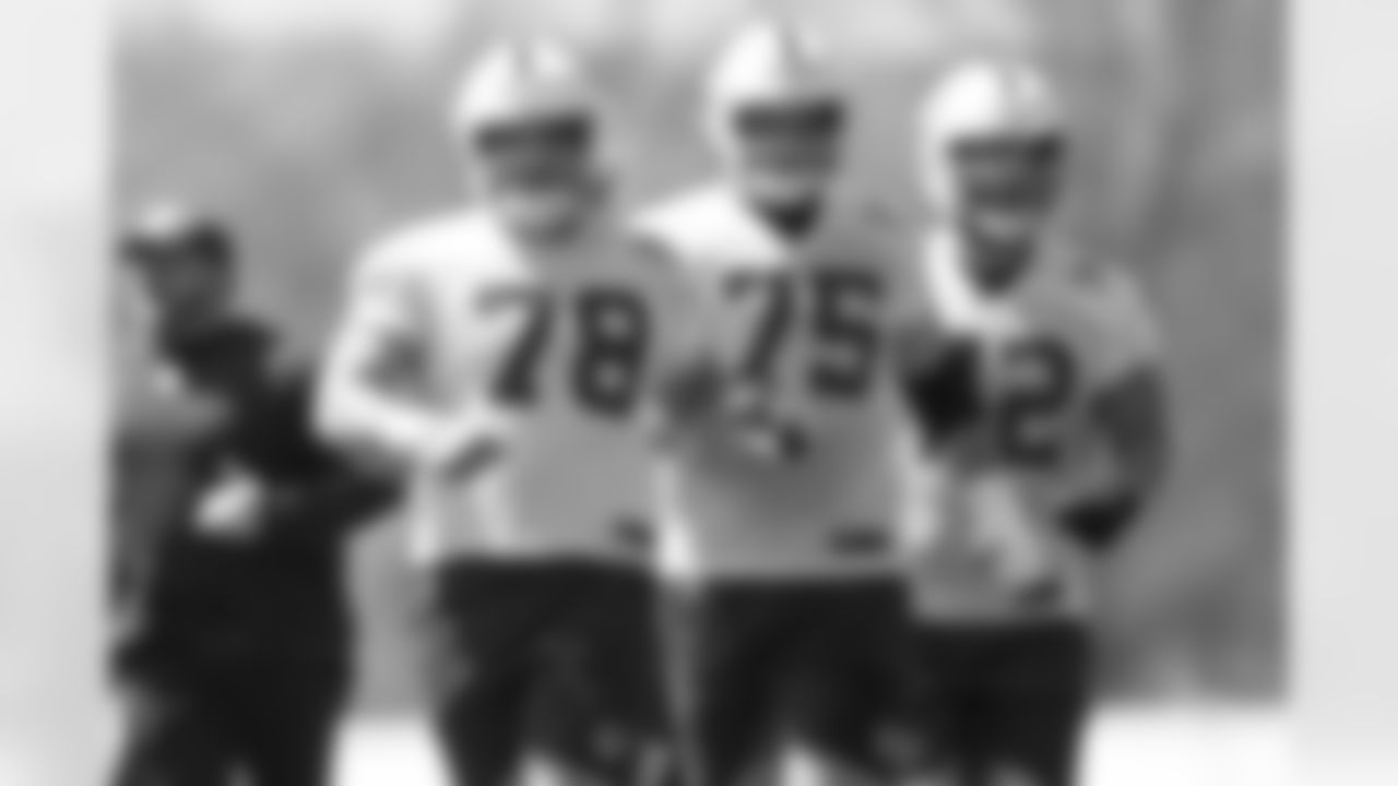 78 C Ryan Kelly, 75 G Will Fries, 72 T/G Braden Smith
Players practice during voluntary minicamp offseason workouts.