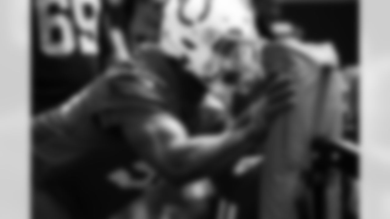 51 DE Kwity Paye,
Players train during OTAs of offseason workouts.
