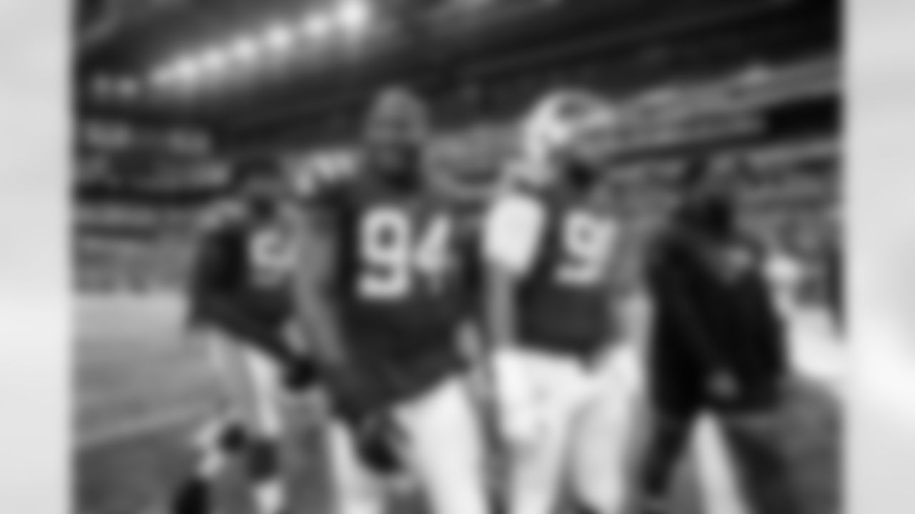 94 DT/DE Tyquan Lewis, #90 DT Grover Stewart,