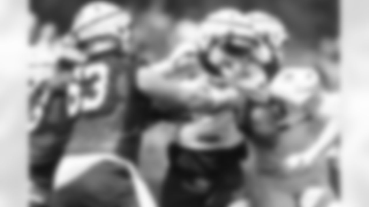 63 G Danny Pinter, #68 DT Byron Cowart