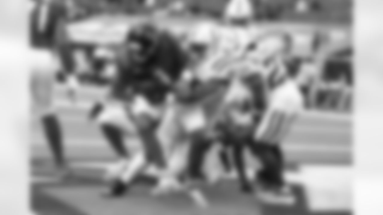 50 DE Justin Houston, #23 CB Kenny Moore II
