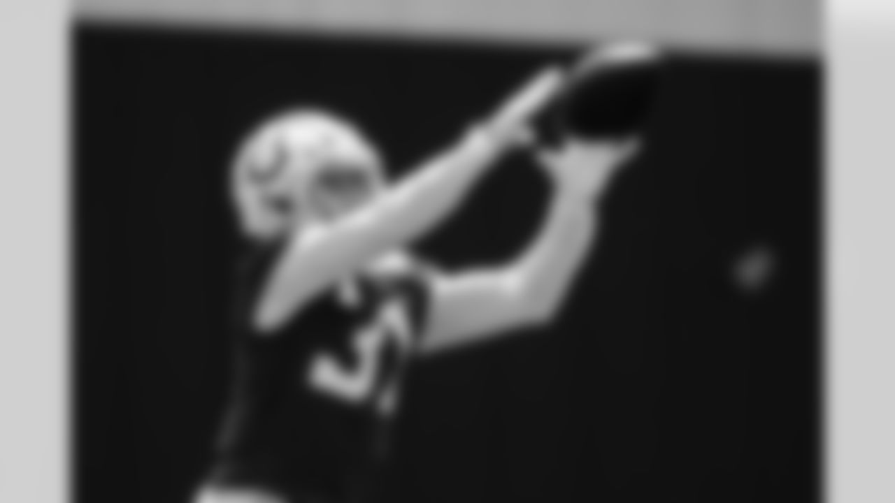 31 S Daniel Scott,
Players train during OTAs of offseason workouts.