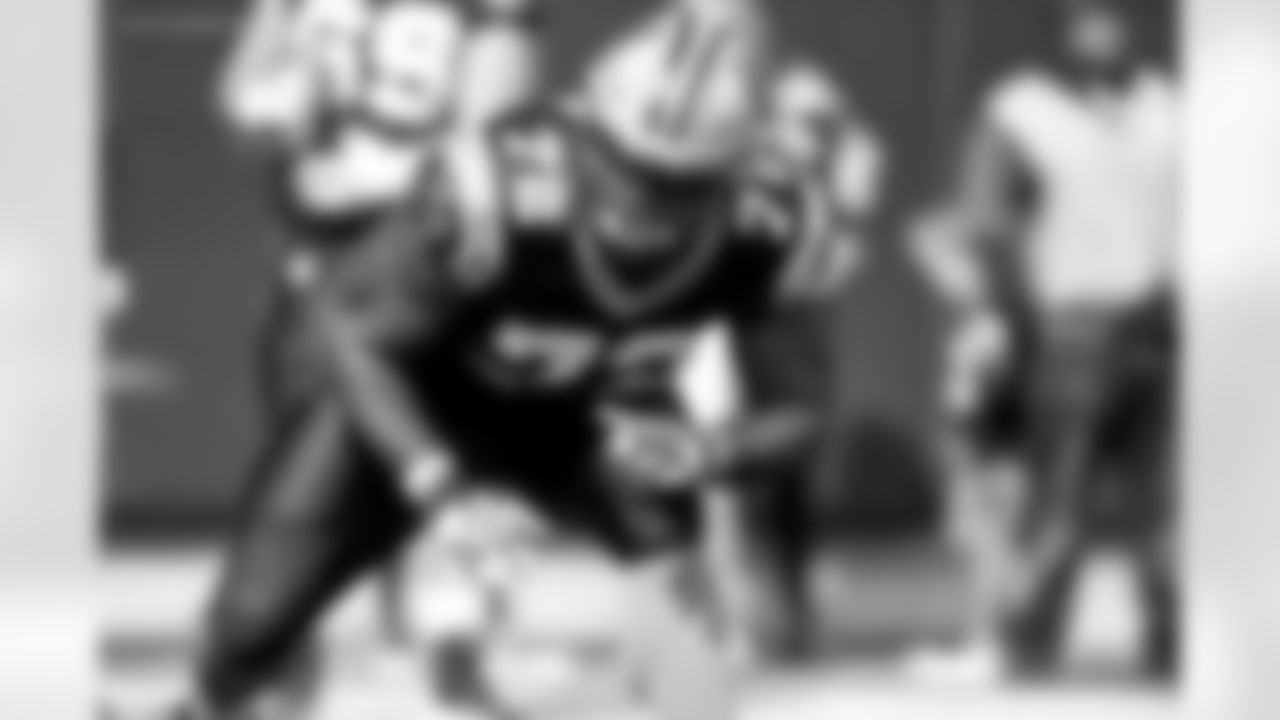 Carolina Panthers offensive tackle Taylor Moton (72) warms up prior to an NFL football game against the Tampa Bay Buccaneers in Charlotte, N.C., Sunday, Nov. 4, 2018. (AP Photo/Mike McCarn)