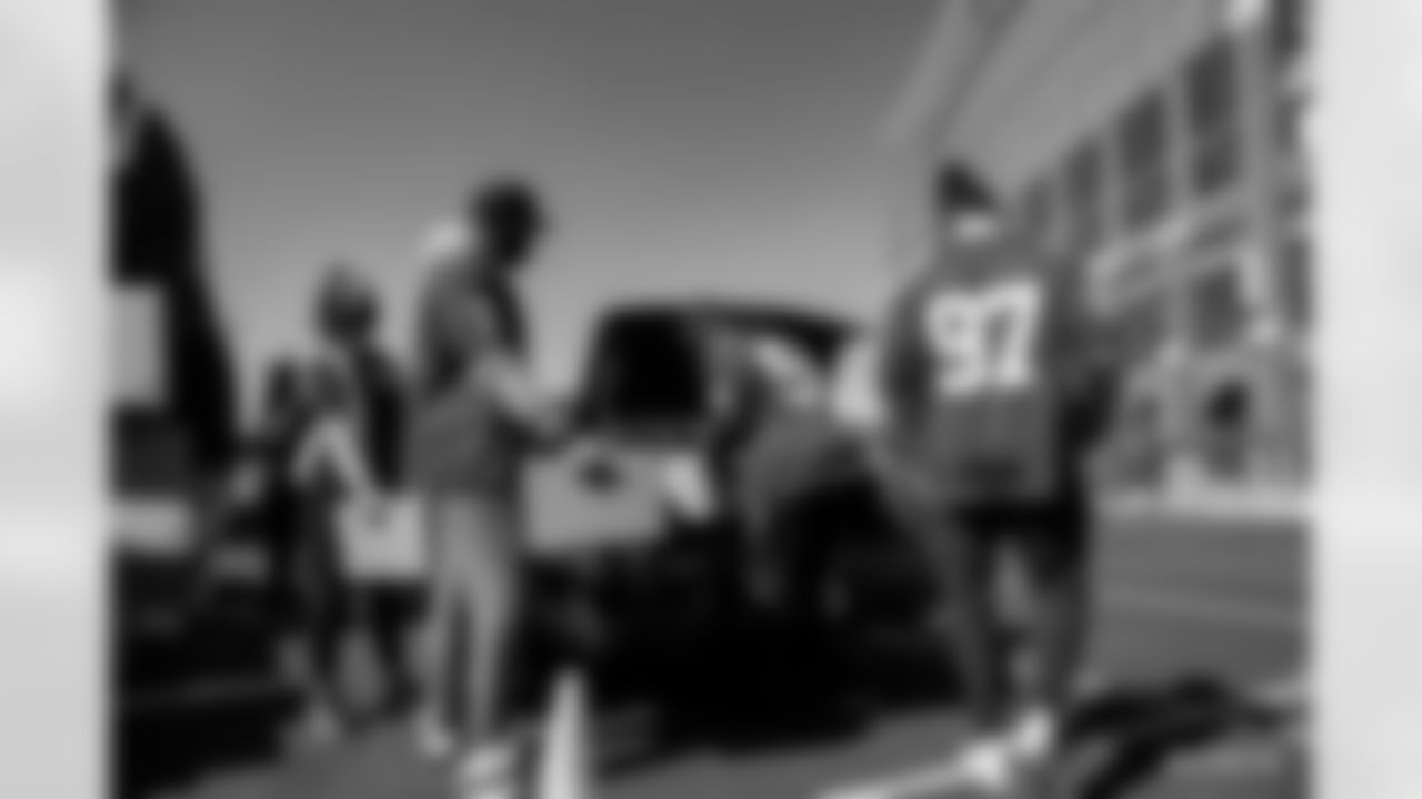 7 QB Jacoby Brissett, #54 LB Anthony Walker, #97 DE Al-Quadin Muhammad