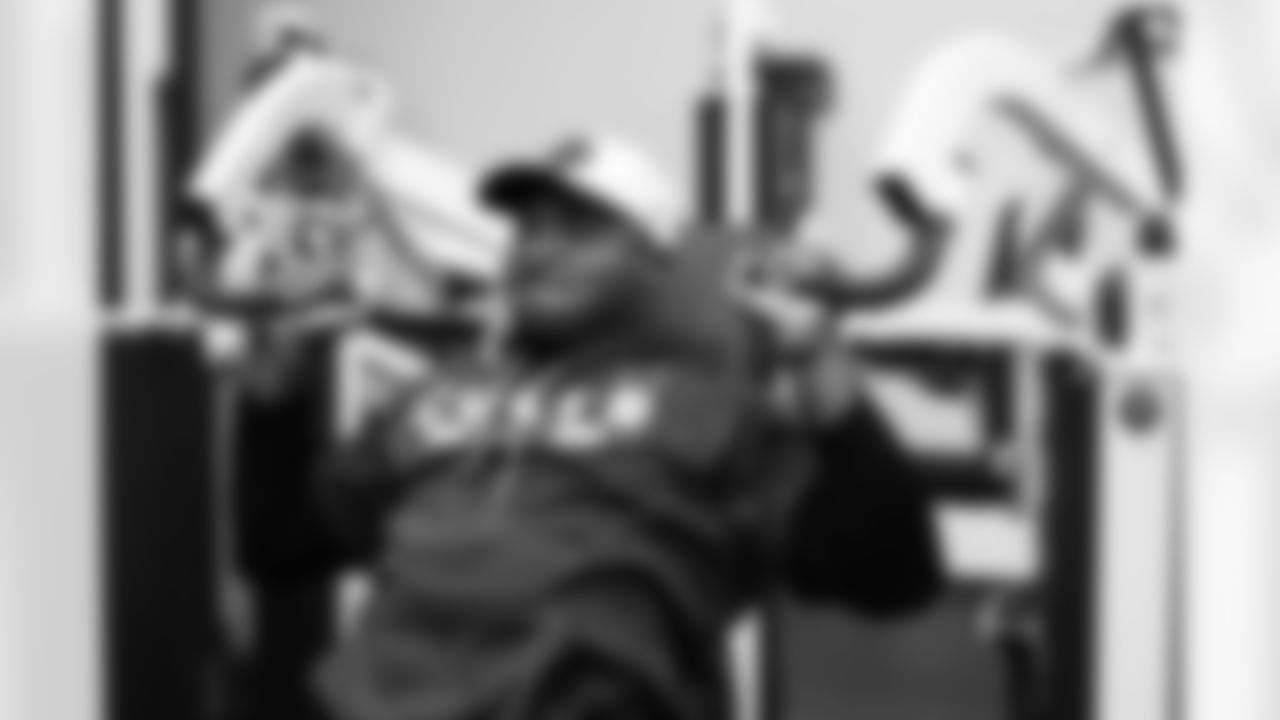 94 DT/DE Tyquan Lewis,
Players train in the weight room during Phase III of offseason workouts.