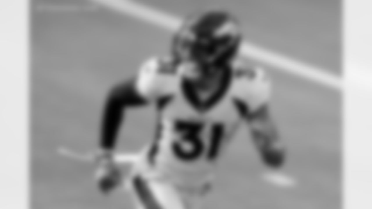 Denver Broncos free safety Justin Simmons warms up before an NFL football game against the Los Angeles Chargers Sunday, Dec. 27, 2020, in Inglewood, Calif. (AP Photo/Ashley Landis)