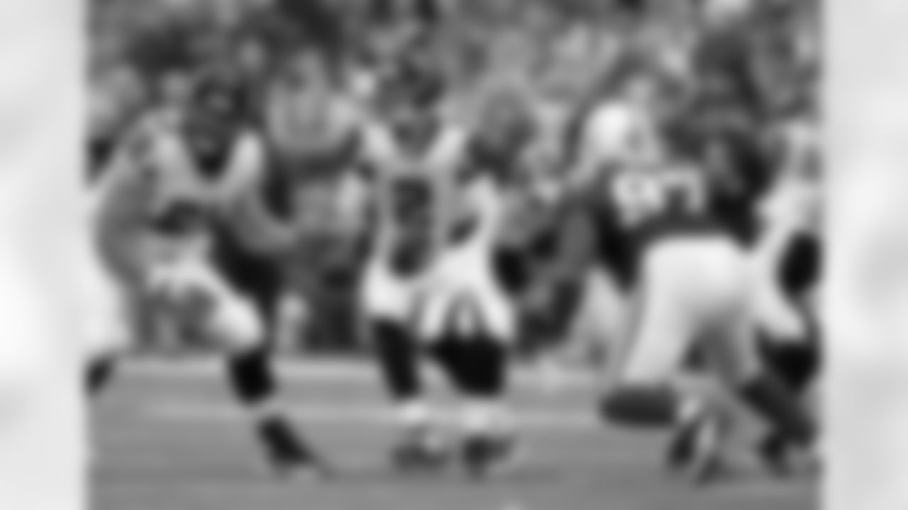 Atlanta Falcons' Matt Ryan (2) takes a snap during the first half of an NFL football game against the Indianapolis Colts Sunday, Nov. 6, 2011, in Indianapolis. (AP Photo/Michael Conroy)