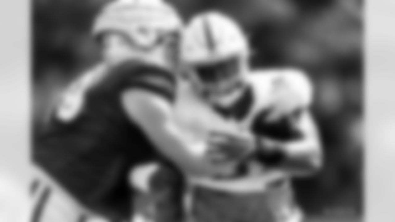 79 T Bernhard Raimann, #97 DT Curtis Brooks