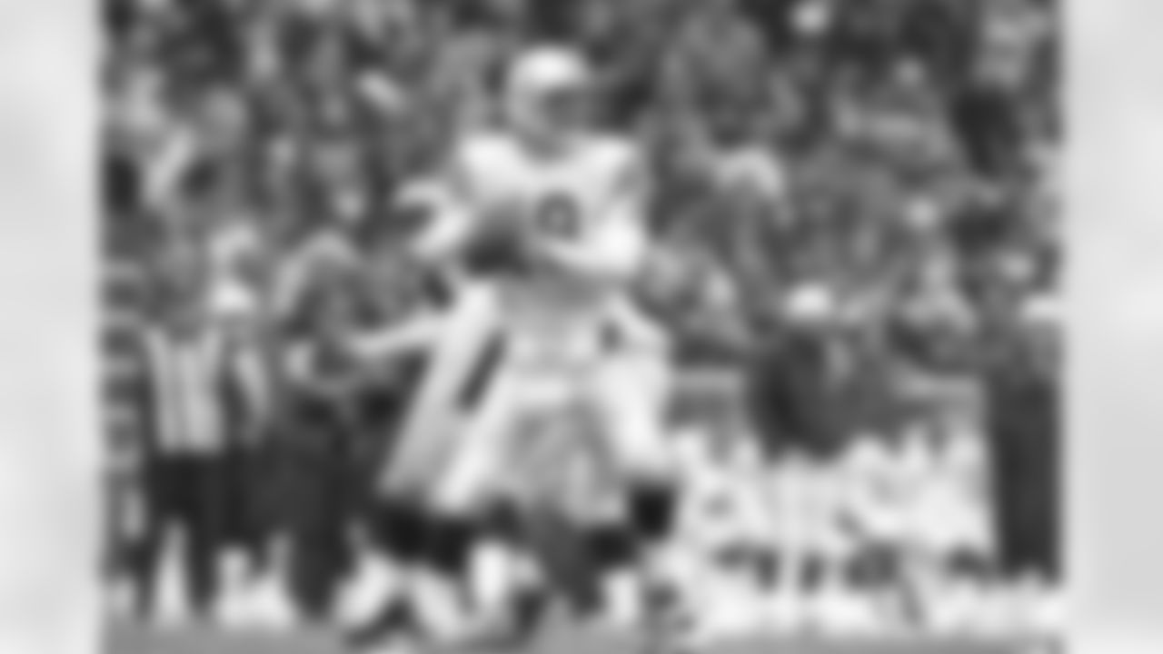 Indianapolis Colts quarterback Peyton Manning (18) sets up to pass during an NFL game against the Green Bay Packers in Green Bay, Wisc., on November 19, 2000. The Packers defeated the Colts 26-24. (AP Photo/Jim Biever)