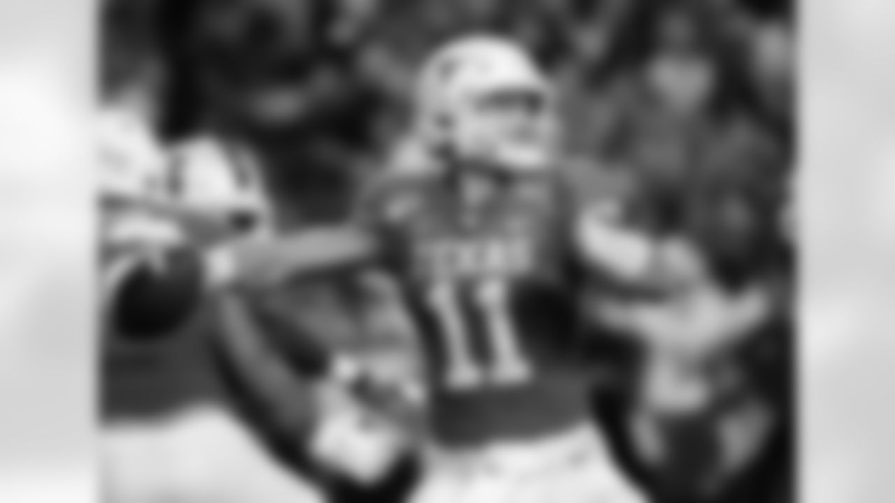 FILE - Texas quarterback Sam Ehlinger (11) throws against Louisiana Tech during the second half of an NCAA college football game, Saturday, Aug. 31, 2019, in Austin, Texas. Ehlinger is a candidate for the 2020 Heisman Trophy award. (AP Photo/Eric Gay, File)