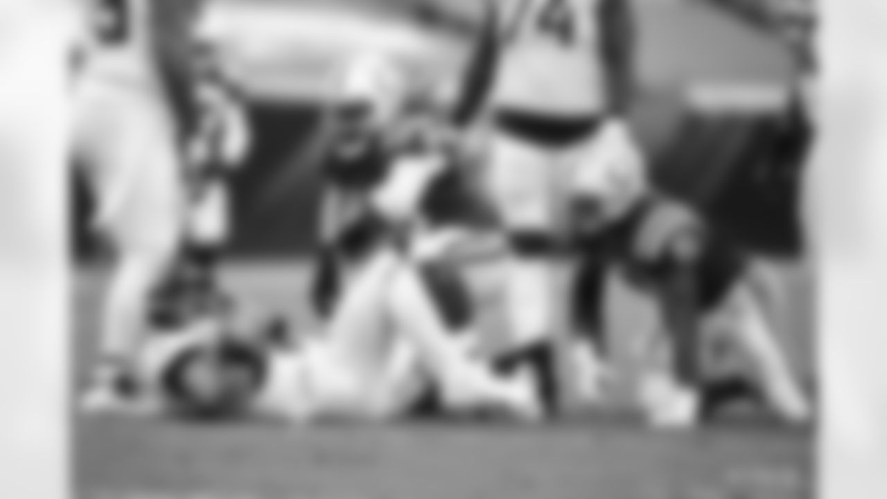 96 DT/DE Denico Autry, #97 DE Al-Quadin Muhammad