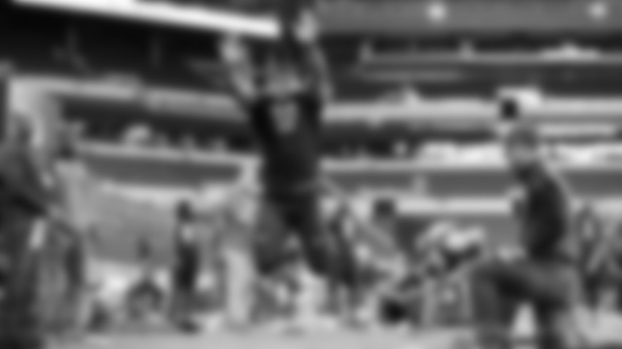 Northwestern linebacker Anthony Walker competes in the broad jump at the 2017 NFL football scouting combine Sunday, March 5, 2017, in Indianapolis. (AP Photo/Gregory Payan)