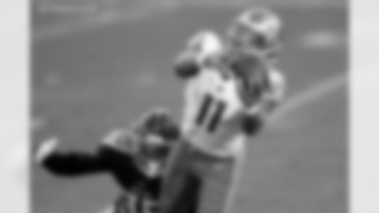Detroit Lions wide receiver Marvin Jones Jr. (11) makes a reception behind Tennessee Titans defensive back Chris Jackson (35) during an NFL football game, Sunday, Dec. 20, 2020, in Nashville, Tenn. The Titans defeated the Lions 46-25. (Joe Robbins via AP)
