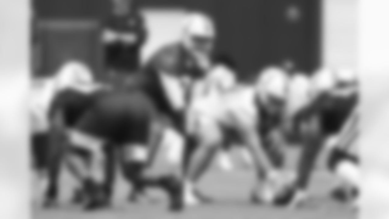 3 QB Brett Hundley, #68 C Joey Hunt