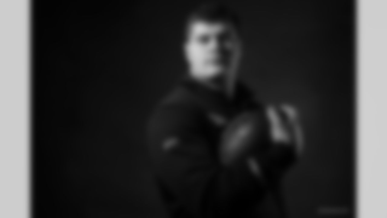 Iowa offensive lineman Tyler Linderbaum (27) poses for a portrait during the NFL Scouting Combine, Saturday, March 5, 2022 in Indianapolis. (Todd Rosenberg via AP)