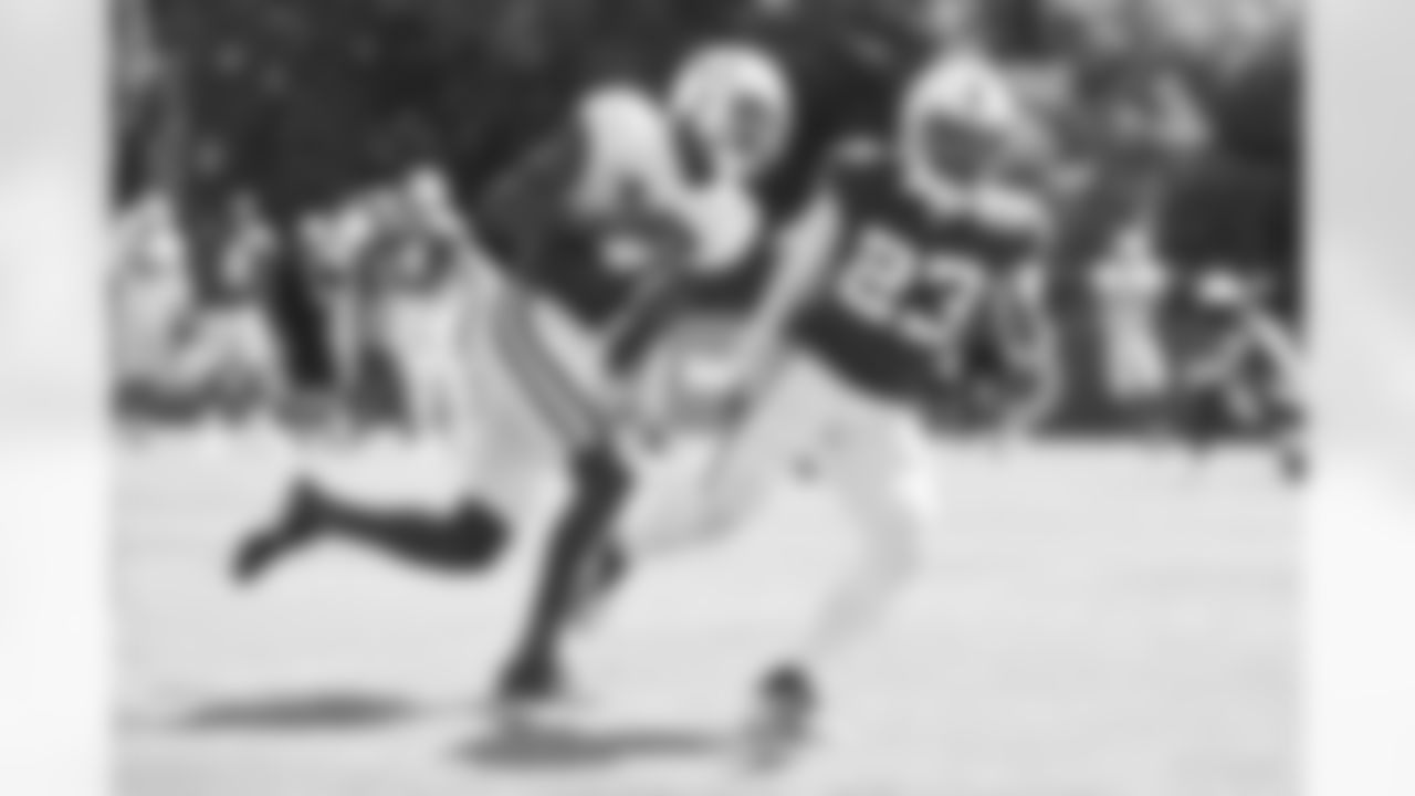 17 WR Mike Strachan, #23 CB Kenny Moore II