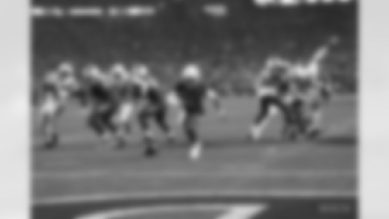 97 DE Al-Quadin Muhammad, #54 DE Dayo Odeyingbo, #45 LB E.J. Speed