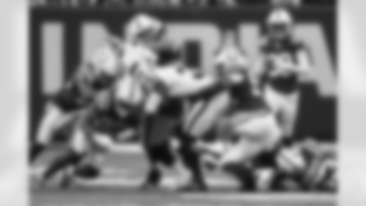 58 LB Bobby Okereke, #23 CB Kenny Moore II, #90 DT Grover Stewart, #97 DE Al-Quadin Muhammad, #53 LB Darius Leonard
