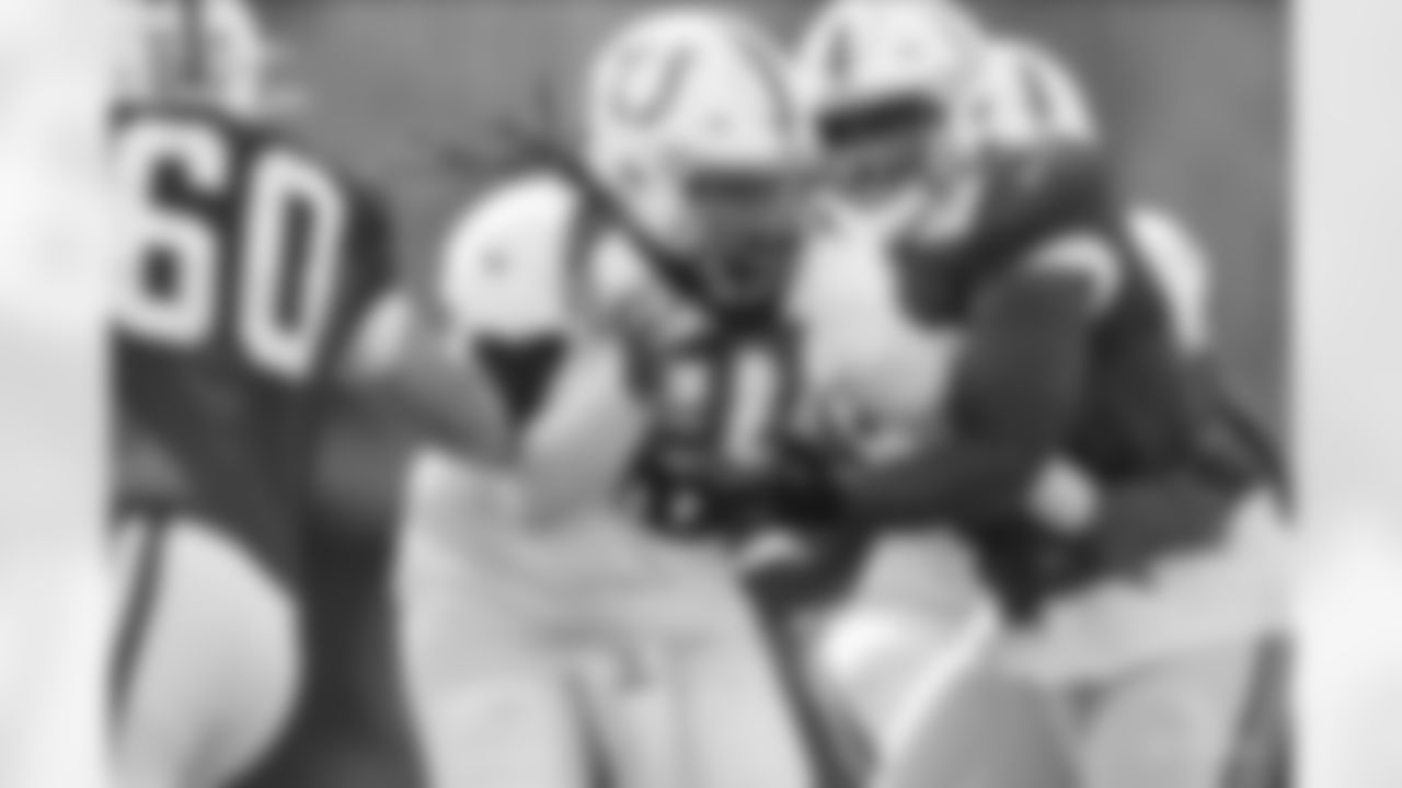 91 DT Sheldon Day, #62 G/T Le'Raven Clark