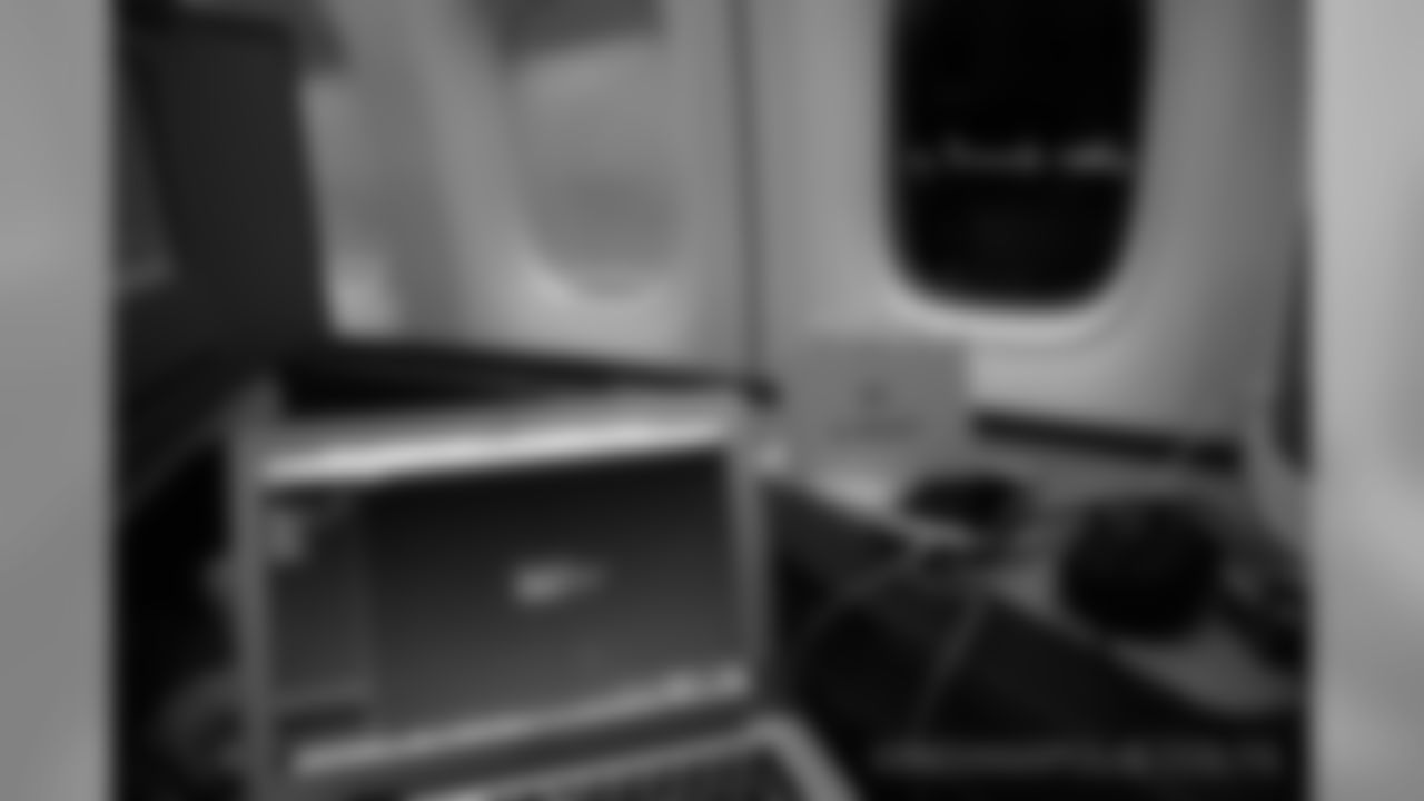 Editing my photos on the flight home. WHAT A WIN!!!!!!! OFF TO FOXBORO!