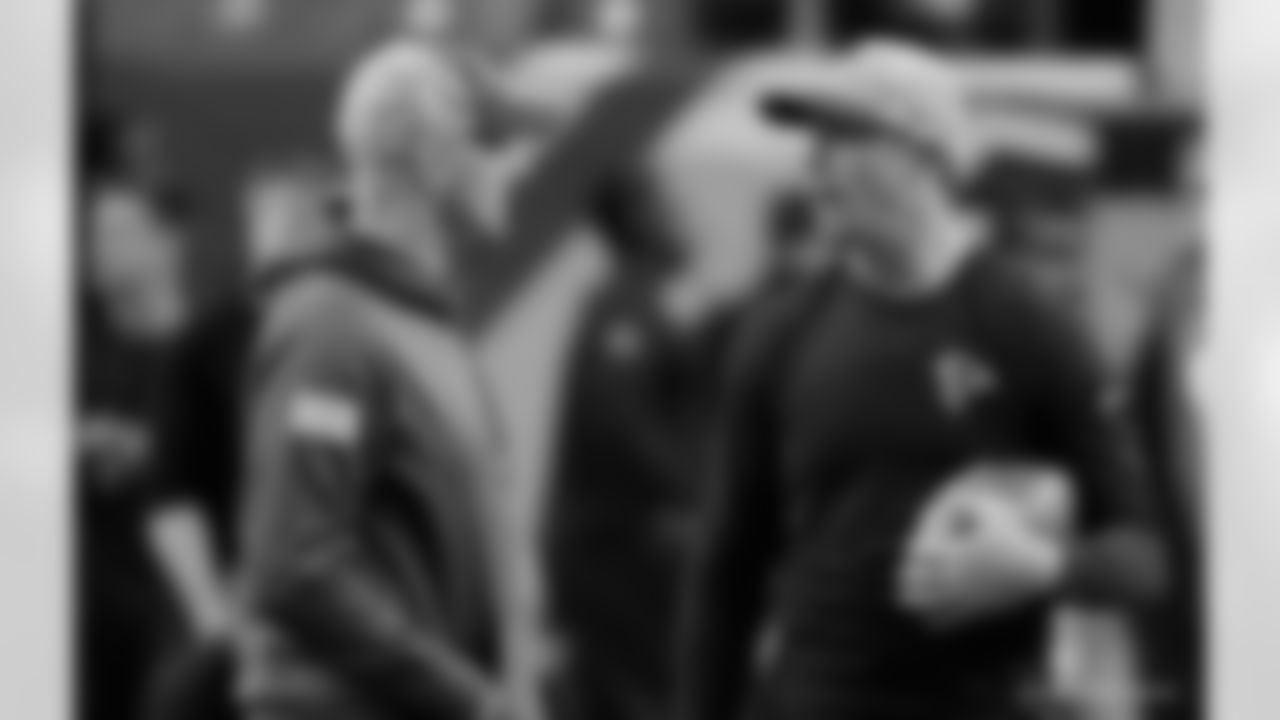Indianapolis Colts quarterback Matt Hasselbeck, left, speaks with Atlanta Falcons quarterback Matt Ryan before the first of an NFL football game, Sunday, Nov. 22, 2015, in Atlanta. (AP Photo/David Goldman)