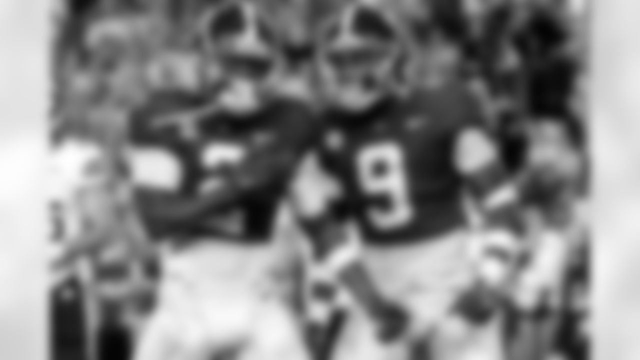 Alabama defensive backs DeMarcco Hellams (2) and Jordan Battle (9) celebrate after a stop against Mississippi State during the first half of an NCAA college football game, Saturday, Oct. 22, 2022, in Tuscaloosa, Ala. (AP Photo/Vasha Hunt)