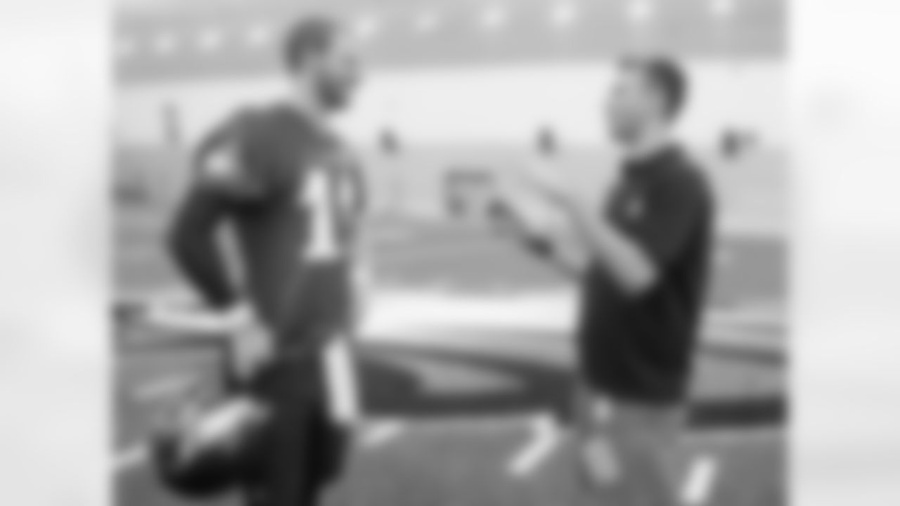 Philadelphia Eagles quarterback Carson Wentz, left, talks with ABC 6 Sports reporter Jeff Skversky, right, during practice at NFL football training camp, Thursday, July 28, 2016, in Philadelphia. (AP Photo/Chris Szagola)