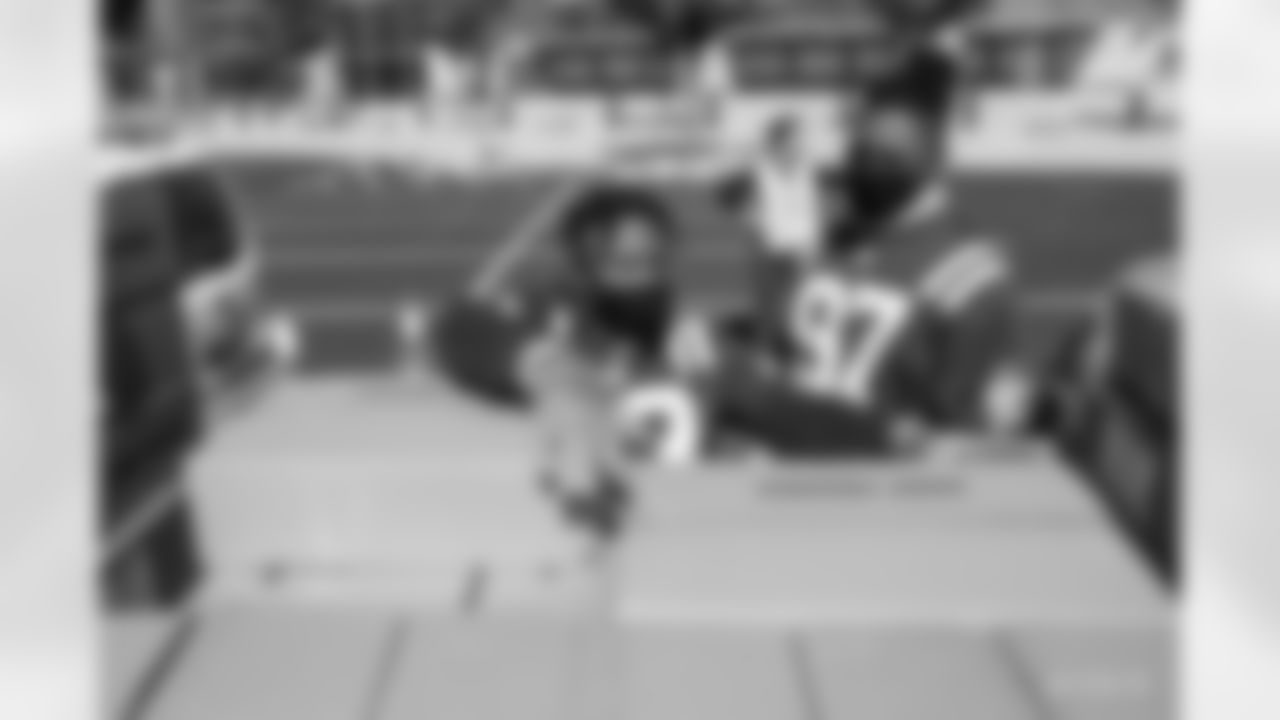 23 CB Kenny Moore II, #97 DE Al-Quadin Muhammad