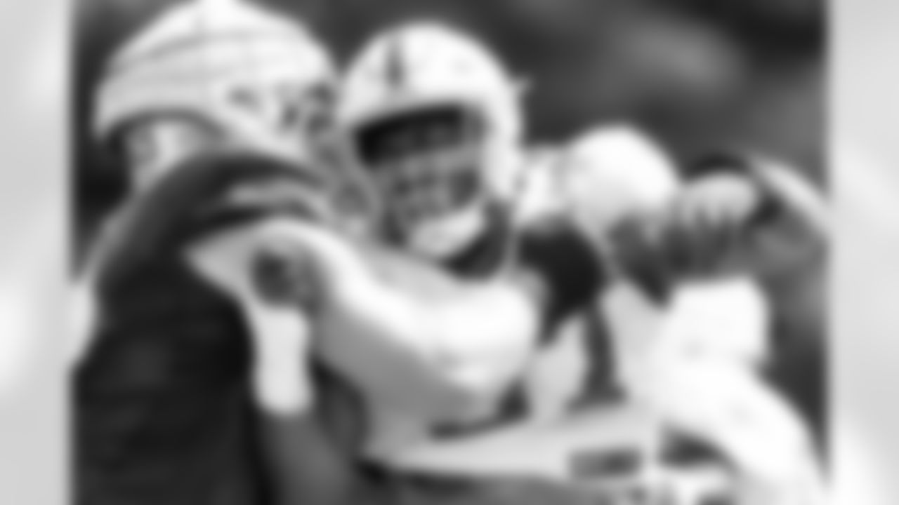 79 T Bernhard Raimann, #97 DT Curtis Brooks