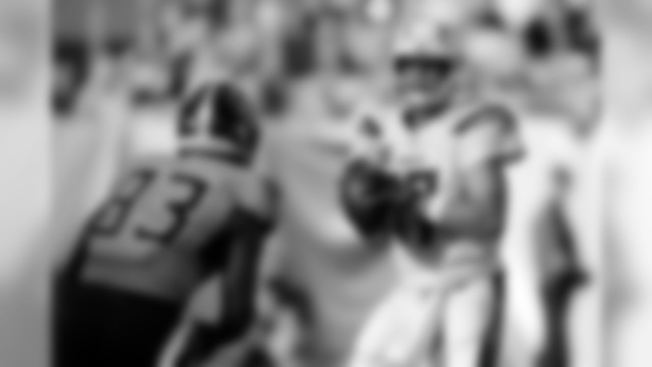Los Angeles Chargers quarterback Philip Rivers (17) is pressured by Tennessee Titans linebacker Reggie Gilbert (93) in the first half of an NFL football game Sunday, Oct. 20, 2019, in Nashville, Tenn. (AP Photo/James Kenney)