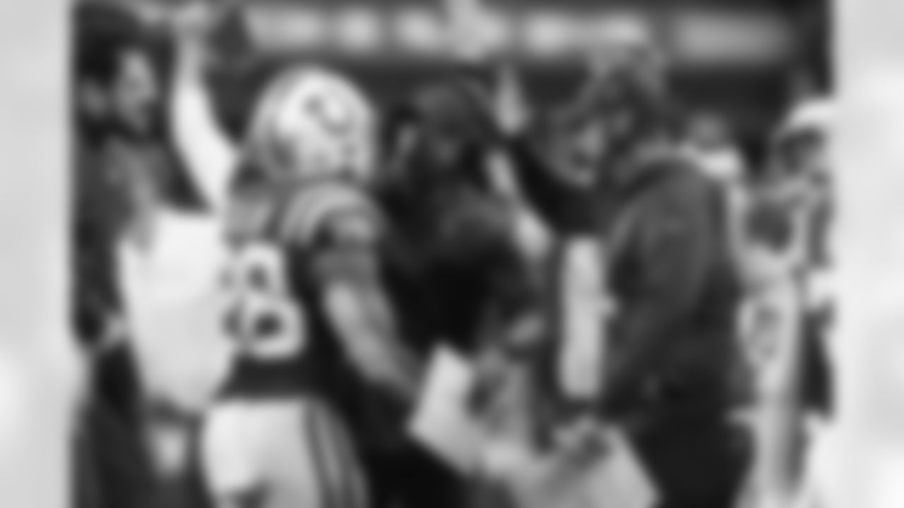 28 RB Jonathan Taylor, Indianapolis Colts Offensive Coordinator Marcus Brady