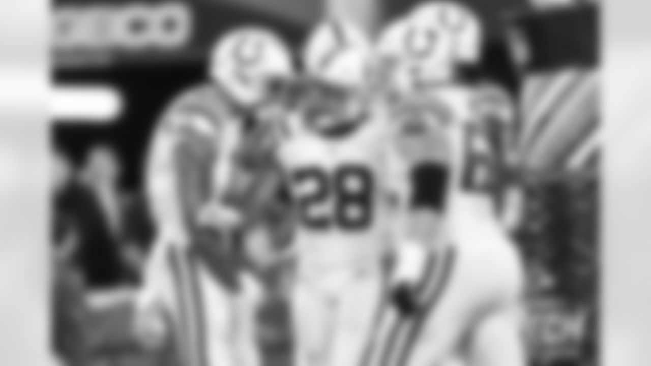 11 WR Michael Pittman Jr., #28 RB Jonathan Taylor, #62 G Chris Reed