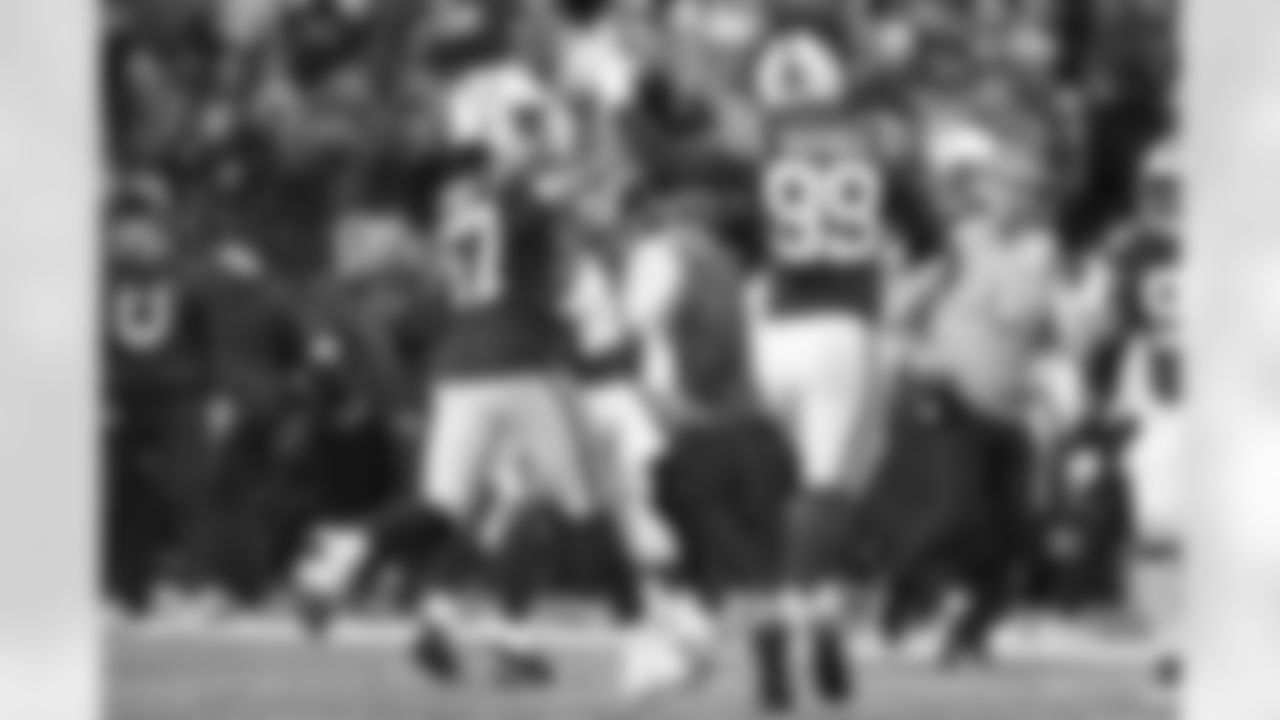 57 DE Kemoko Turay, #99 DT DeForest Buckner