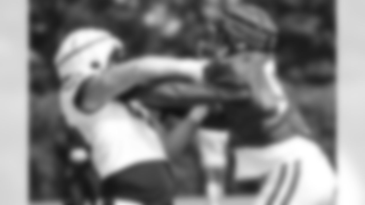 94 DE Tyquan Lewis