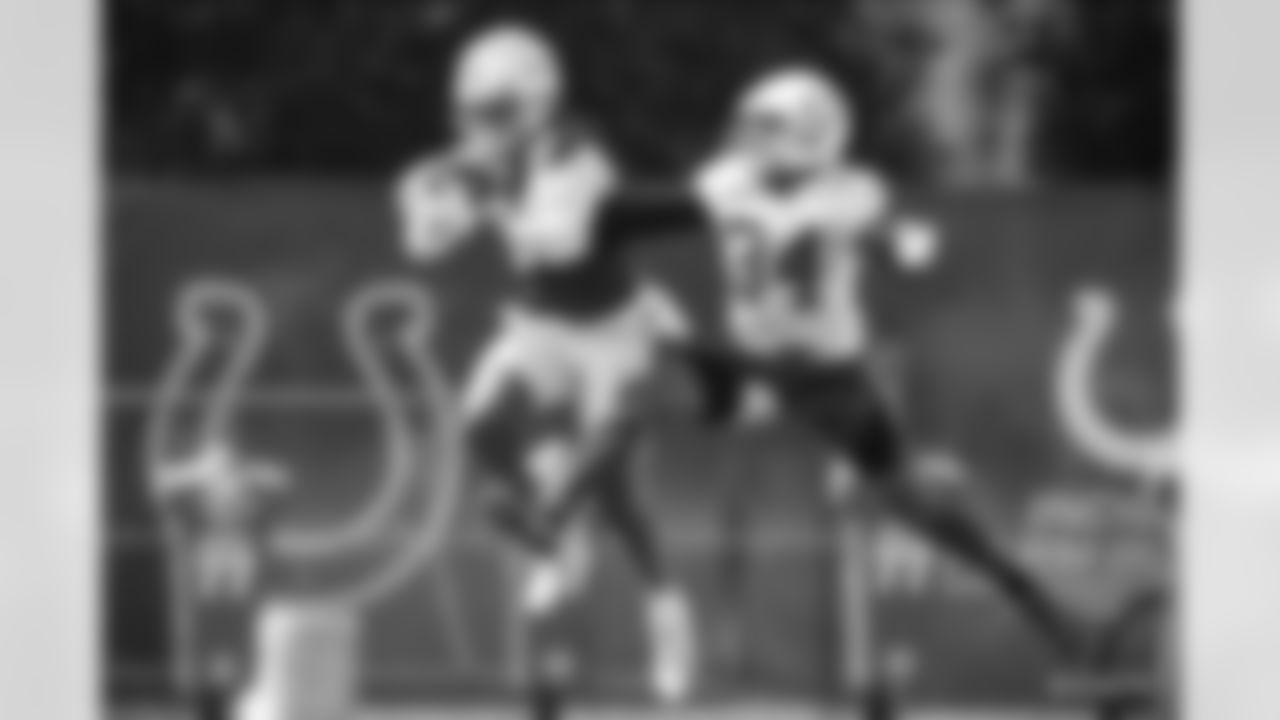 83 WR Marcus Johnson, #34 CB Isaiah Rodgers