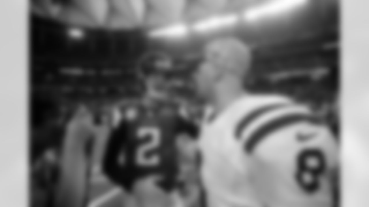 Atlanta Falcons quarterback Matt Ryan (2) speaks with Indianapolis Colts quarterback Matt Hasselbeck (8) after an NFL football game, Sunday, Nov. 22, 2015, in Atlanta. The Indianapolis Colts won 24-21. (AP Photo/David Goldman)