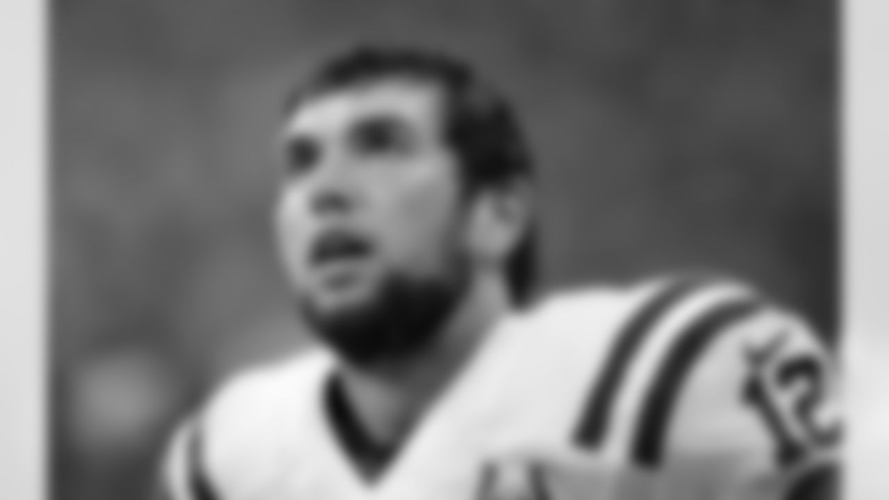 Indianapolis Colts' Andrew Luck watches from the sidelines during the second quarter of an NFL football game against the Houston Texans, Sunday, Nov. 3, 2013, in Houston. (AP Photo/David J. Phillip)